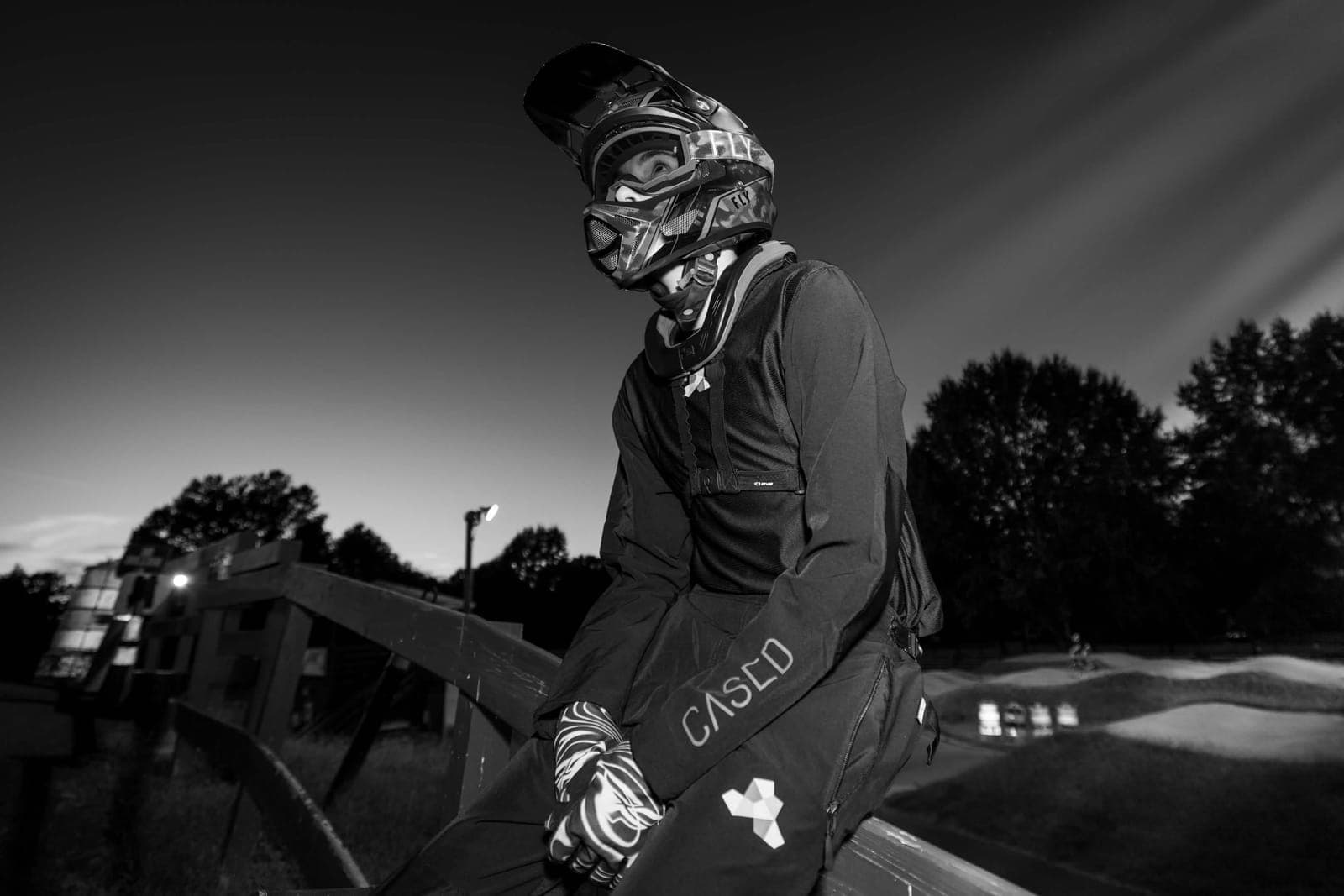 Liam G Adams in BMX race gear at dusk, 2025